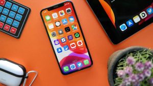 iPhone and iPad on an orange backfground